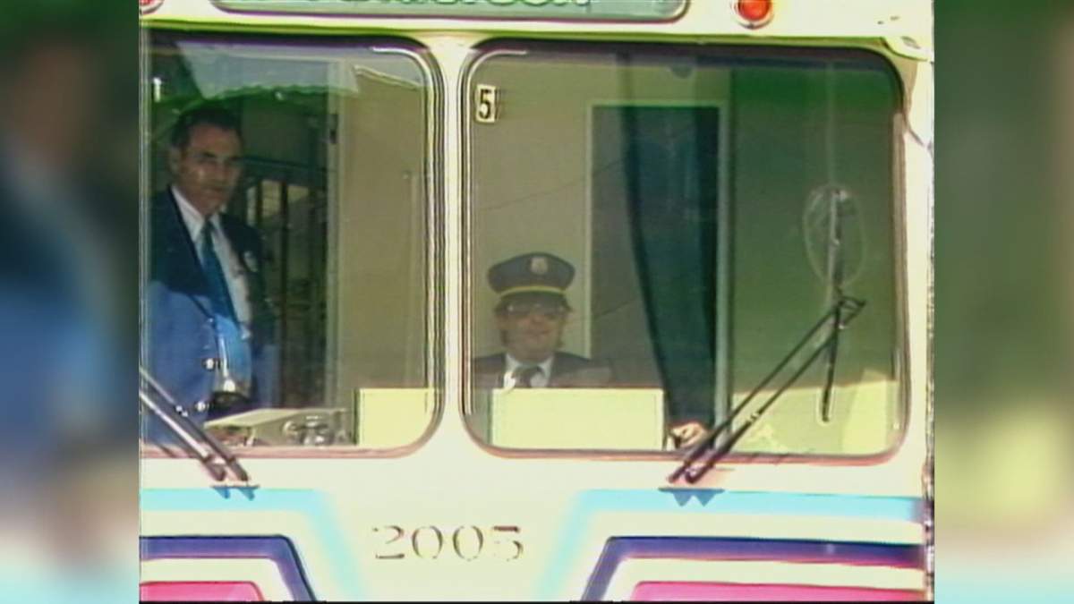 Former Calgary mayor Ralph Klein operating the CTrain to commemorate its first day of operations on May 25, 1981.