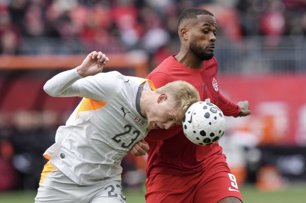 Canada battles back to tie Iceland 2-2