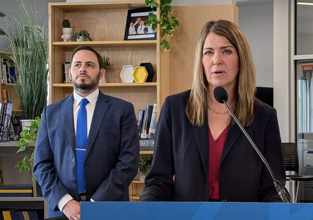 Alberta delays new restrictions on flags in schools, national anthem mandate