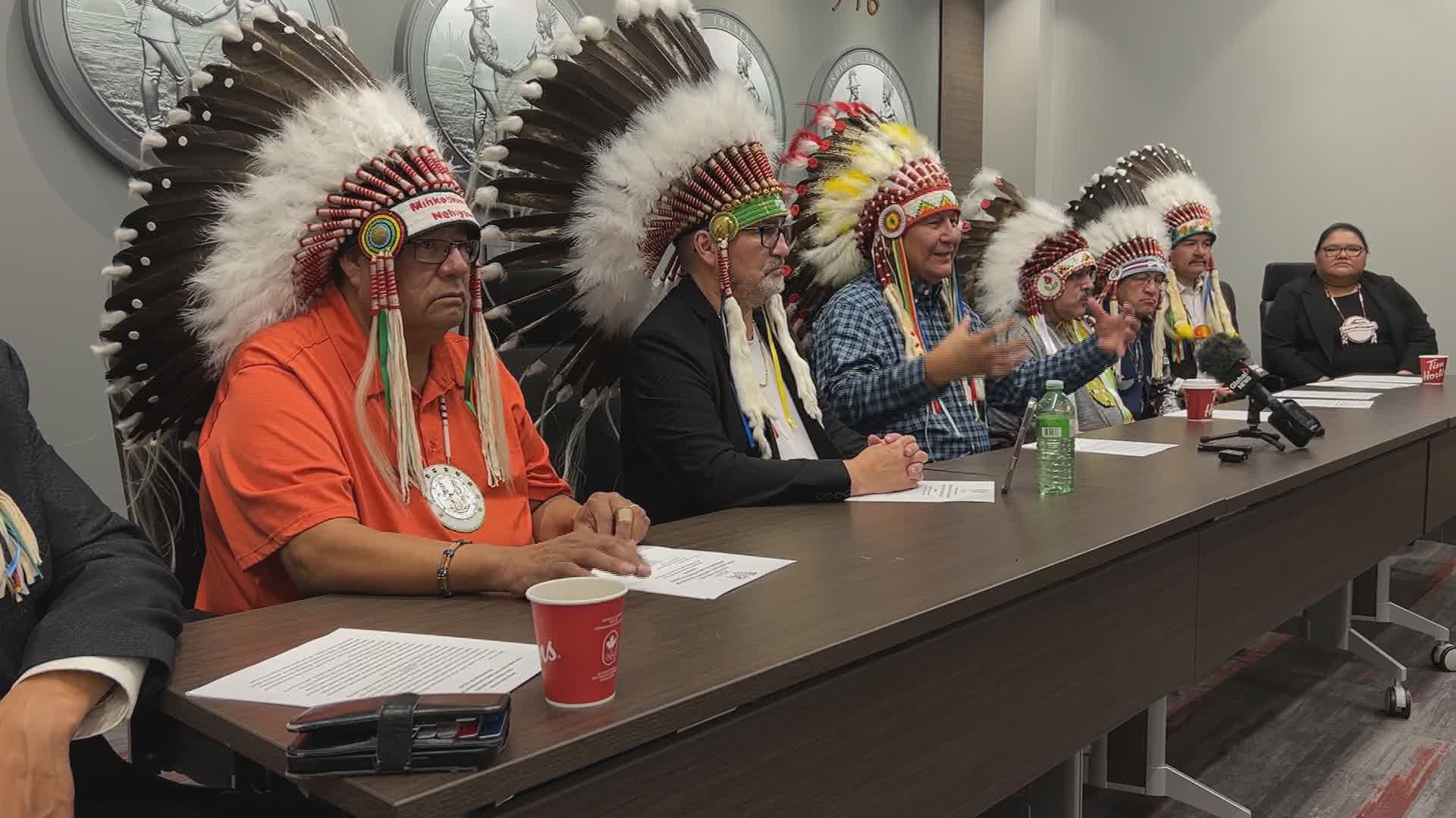 FSIN chiefs sit at a long conference table