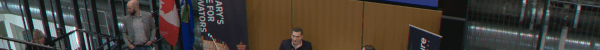Canada's minister of AI and digital innovations speaks to a crowd