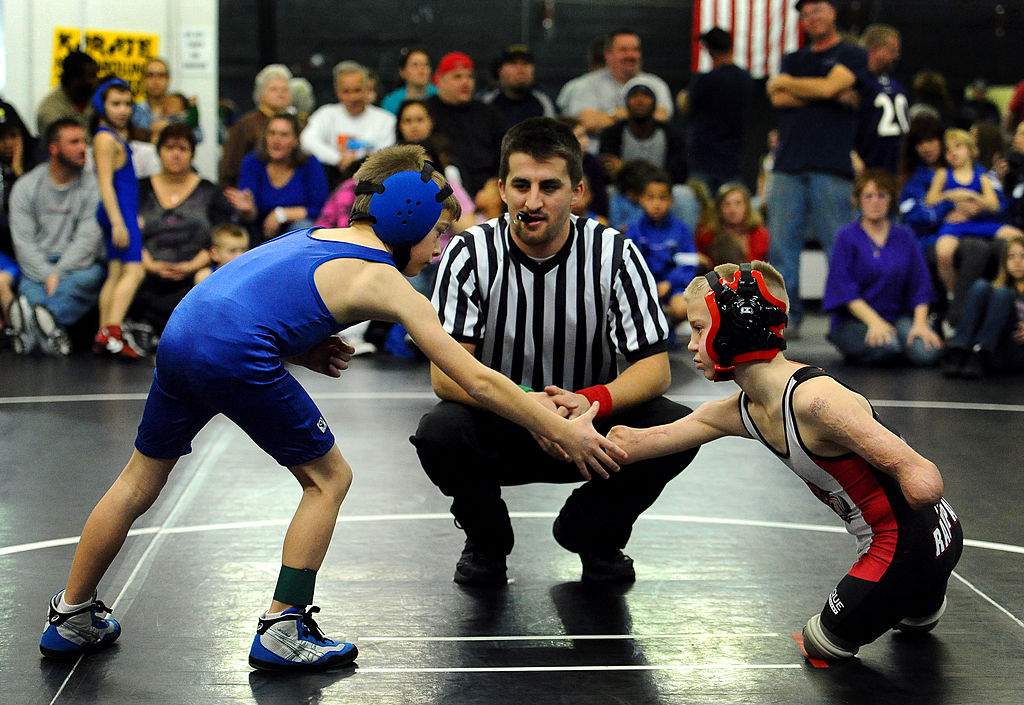 Dayton James Webber shakes hands with his opponent, Mac Scott, before their match on June 22, 2010.