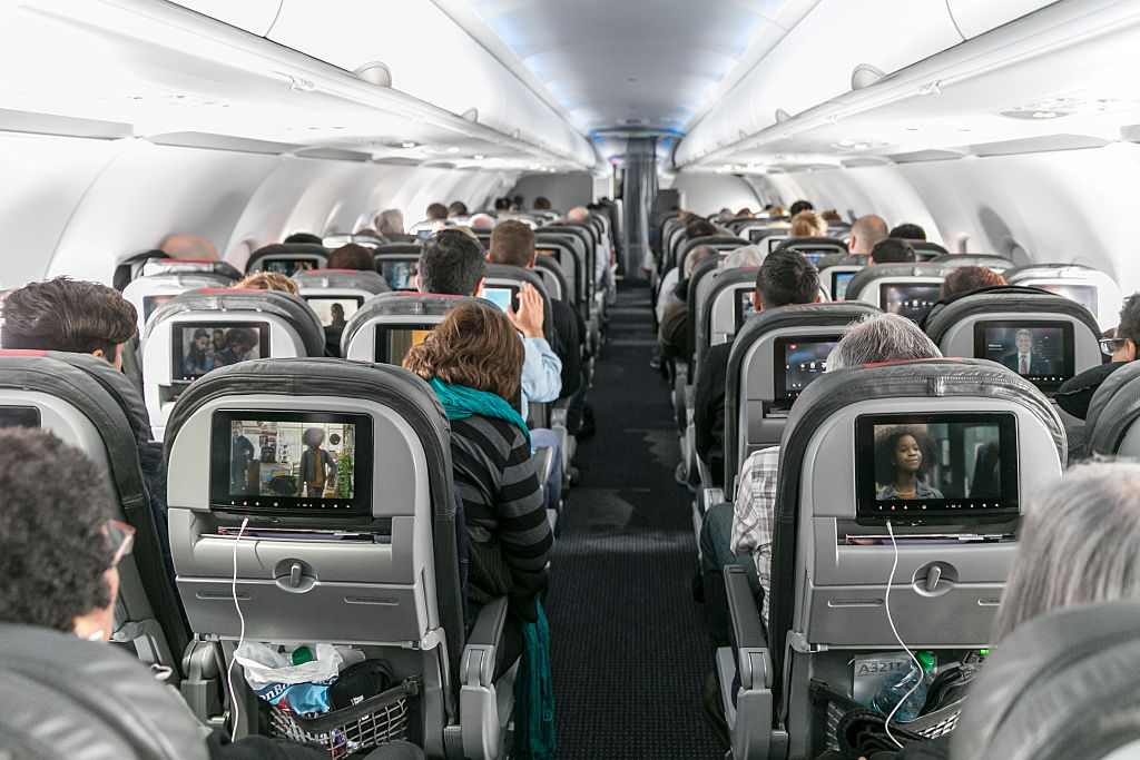 Passengers on an American Airlines Flight From LA To NY on December 2, 2014.				 
										
					 
					Rich Polk/Getty Images for MasterCard
