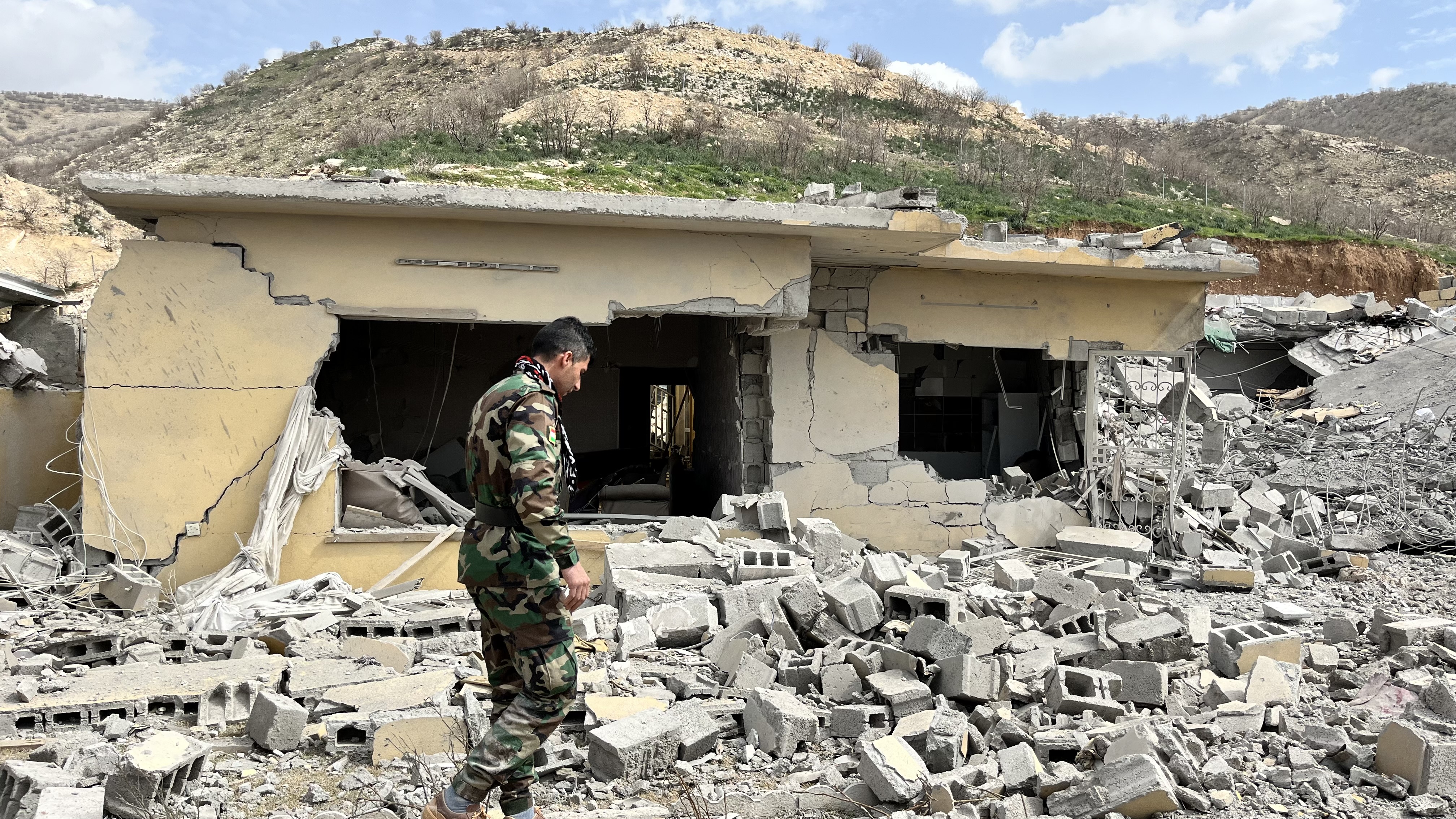 Kurdistan Freedom Movement fighters inspect office struck by Iranian missile, March 7, 2026.