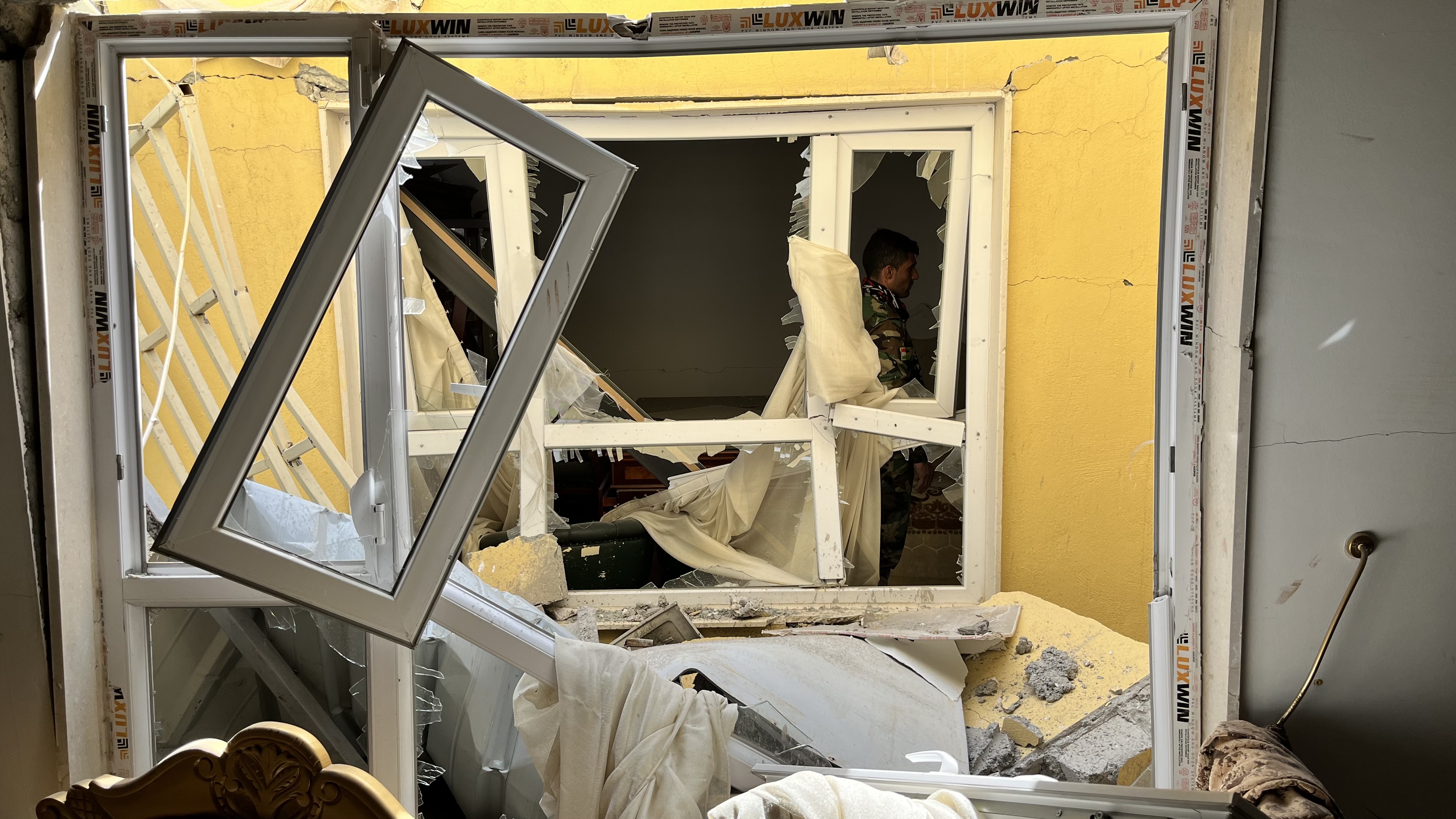 Iranian Kurdish fighter inside building on base that was struck by Iranian missiles, near Erbil, Iraq, March 7, 2026.