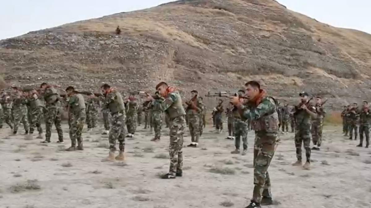 Iraq-based Kurdistan Freedom Party fighters seen training in video.