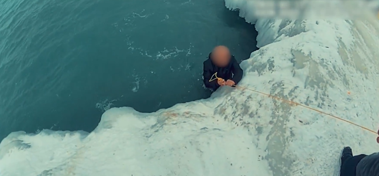 Police say officers quickly rescued a man who fell into the freezing waters of Lake Ontario at the Bowmanville pier, with body-camera footage capturing the dramatic moment.