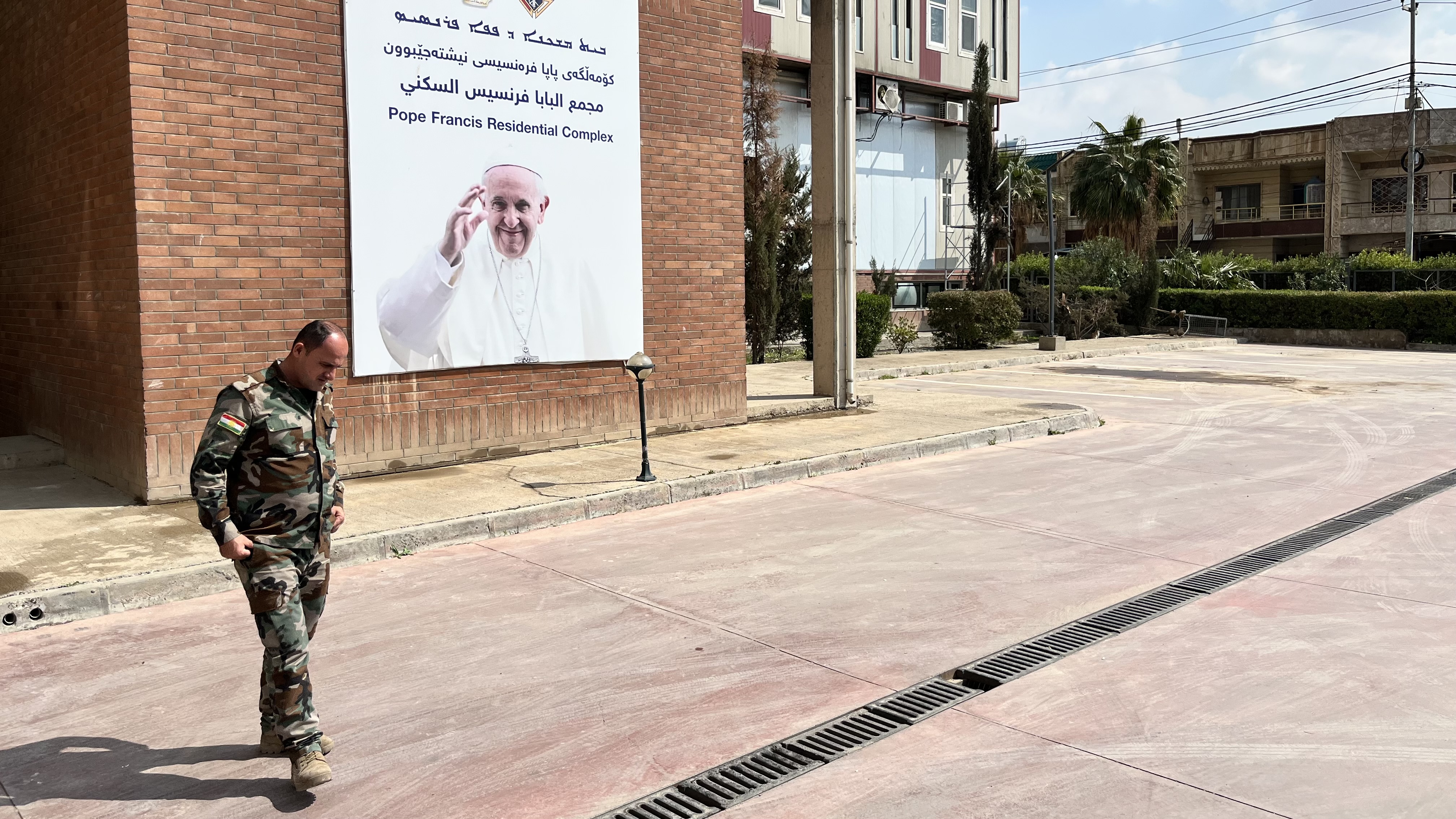 Security guard outside church hit by drone, Erbil, Iraq, March 9, 2026.				 
										
					 
					Stewart Bell/Global News