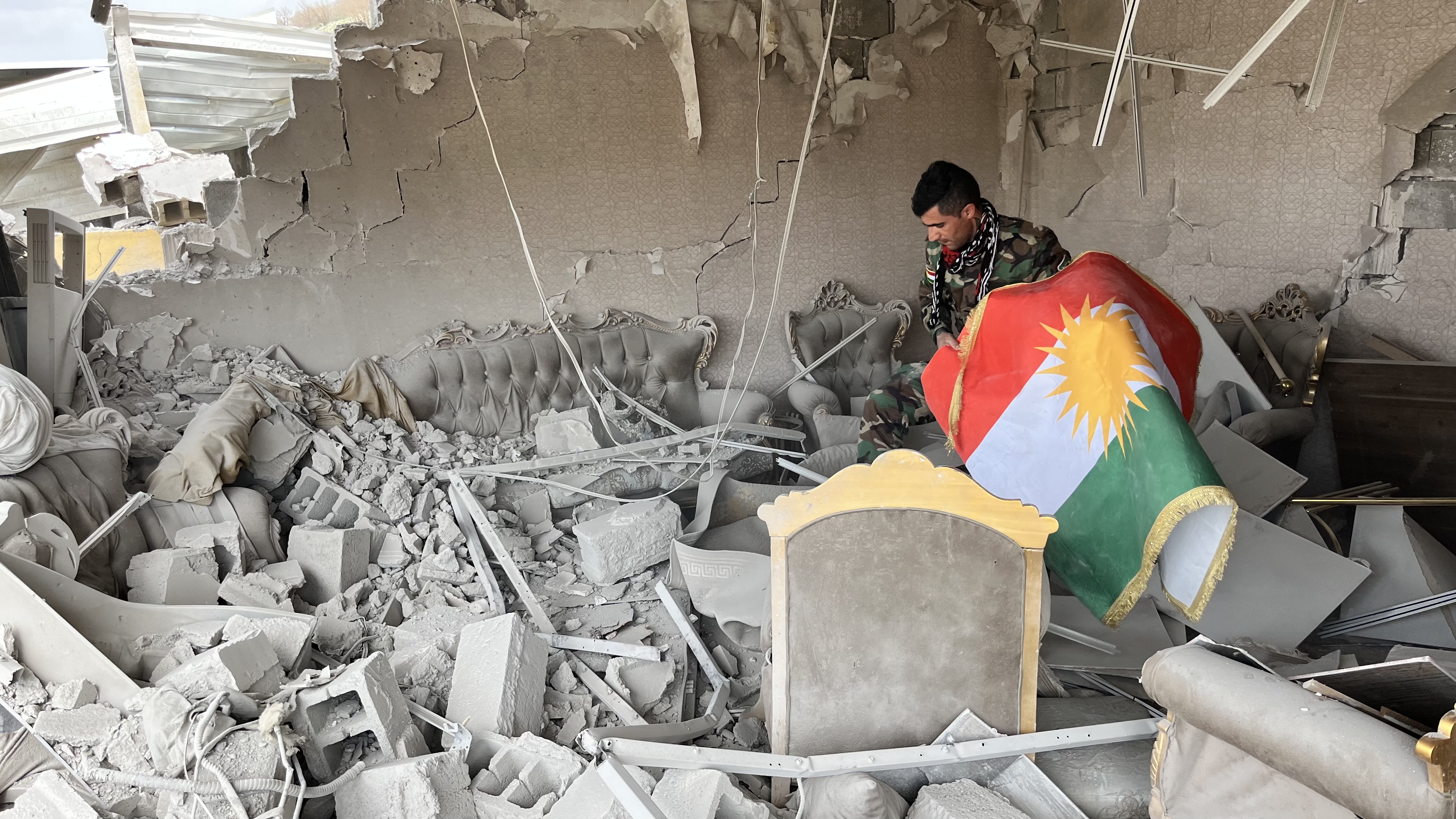 Iranian Kurdish fighters say they’re ready to fight, but waiting for orders