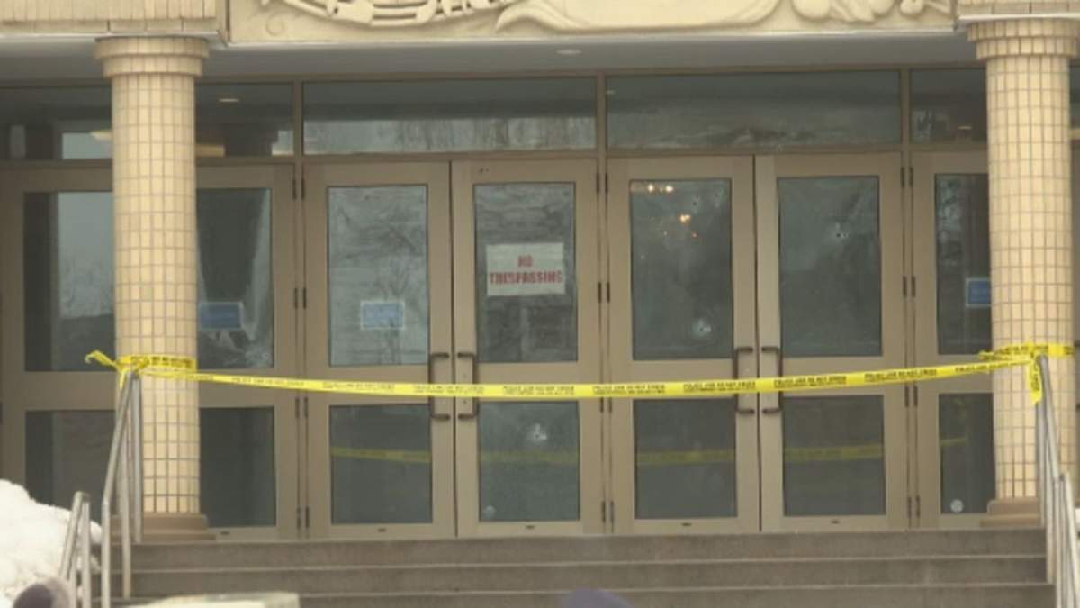 Police tape outside synagogue in Thornhill, Ont. struck by bullets following start of Iran war.
