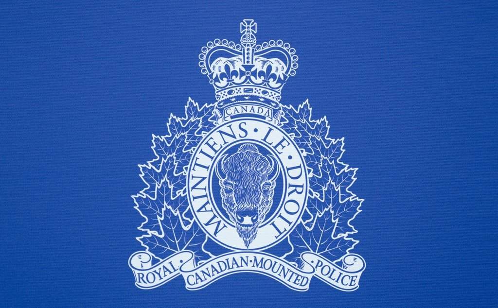 An RCMP logo is seen at a news conference, in St. John's, N.L., Saturday, June 24, 2023. THE CANADIAN PRESS/Adrian Wyld.
