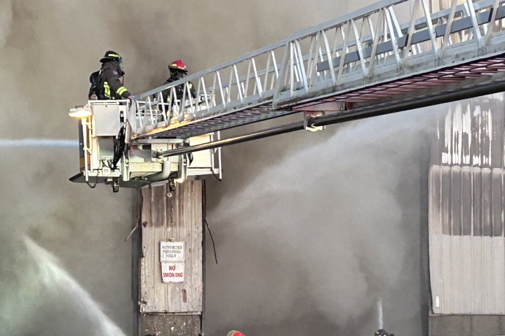 Toronto dispatches 80 firefighters to massive blaze at waste removal company