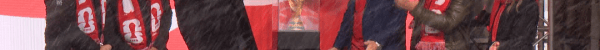 Representatives unveil the FIFA World Cup trophy on Sunday.