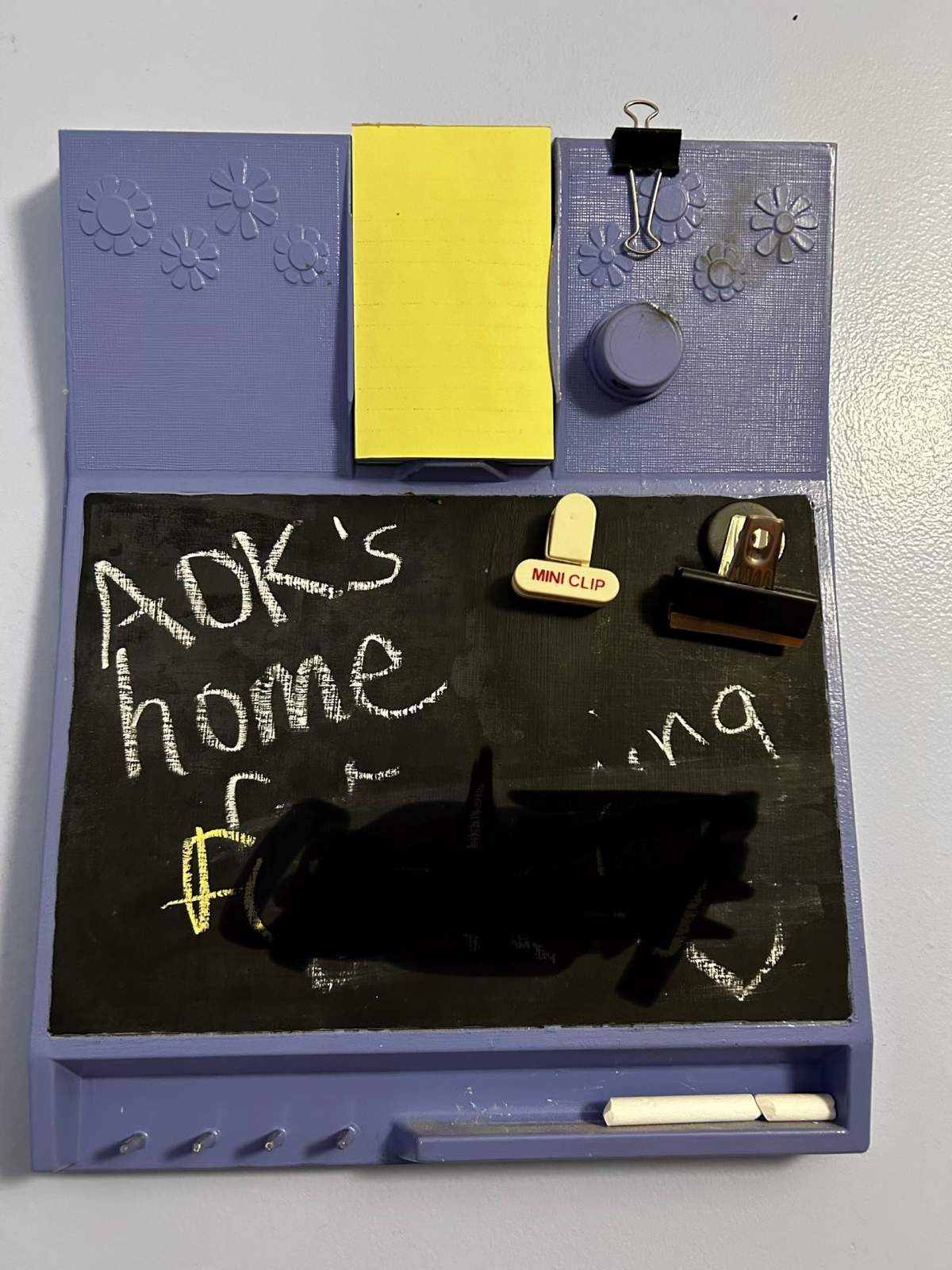 The obscene message was left on a chalkboard in the home's kitchen.