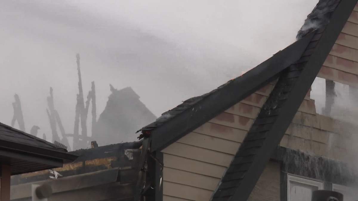 Calgary firefighters were forced to battle high winds as they also fought to extinguish a house fire in the community of Mahogany on Friday.