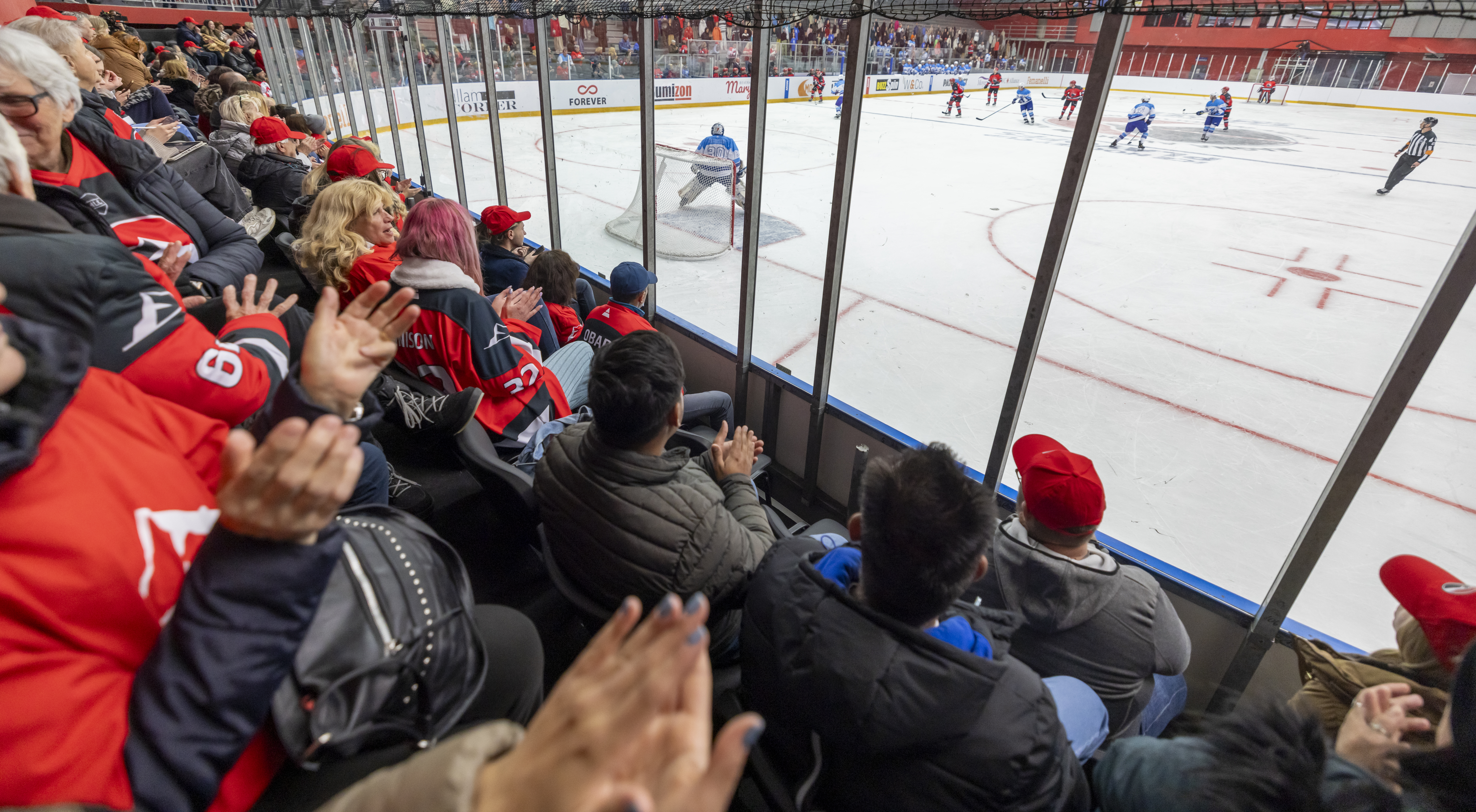 Shirtless fans climb hockey boards, break glass at Ontario rink: OPP
