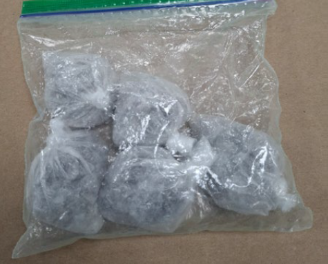Calgary police say four people have been charged and a variety of drugs seized following an investigation into the alleged online sale of stolen property.