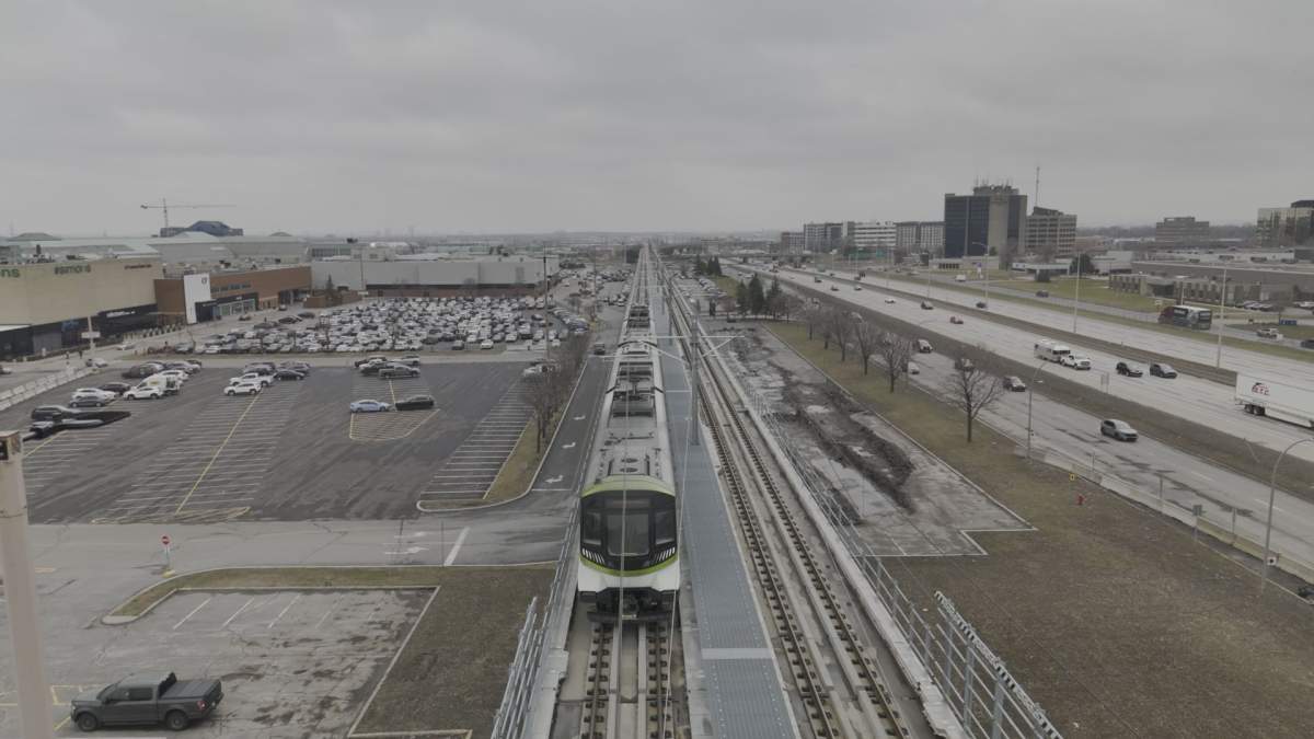 A REM train arrives at the Fairview-Pointe-Claire station on April 15, 2026.