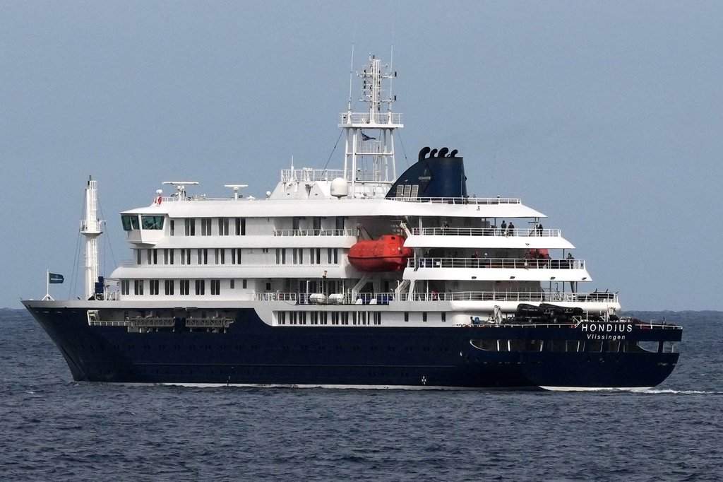 The MV Hondius cruise ship departs the port in Praia, Cape Verde, Wednesday, May 6, 2026. 