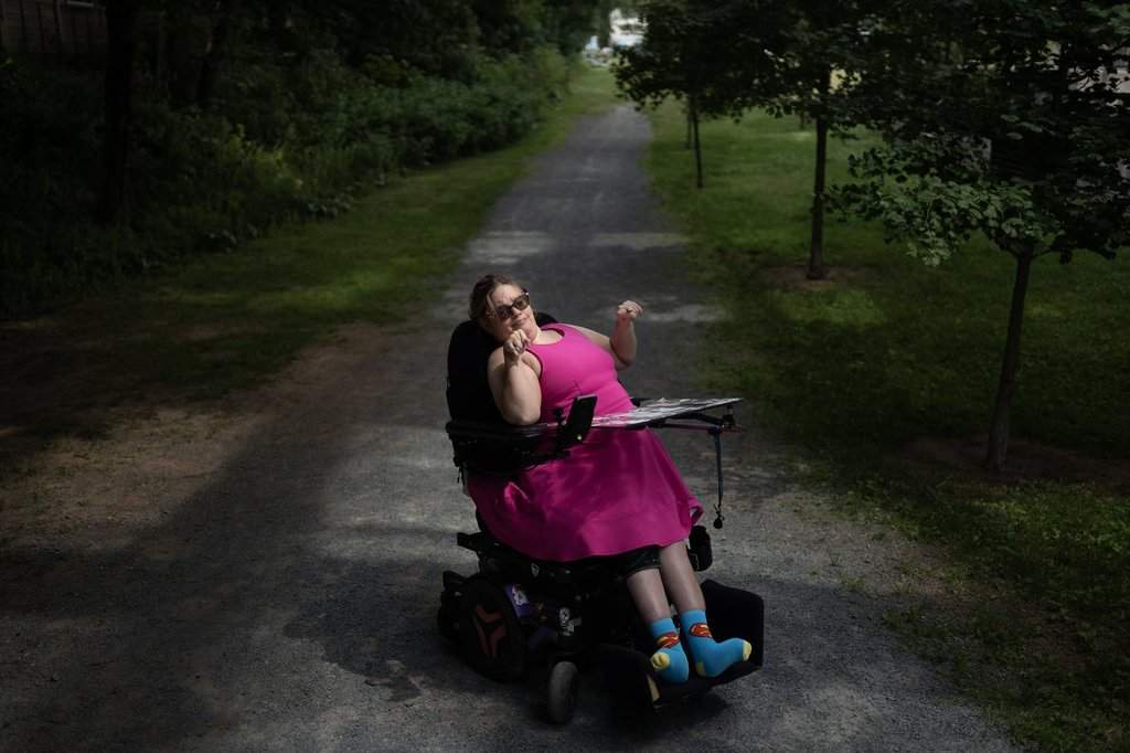 Victoria Levack, who lives with cerebral palsy, poses in Halifax on Thursday, July 31, 2025. THE CANADIAN PRESS/Darren Calabrese.