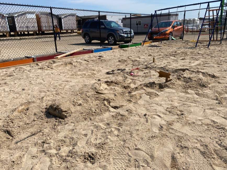 The empty space where the play structure was.