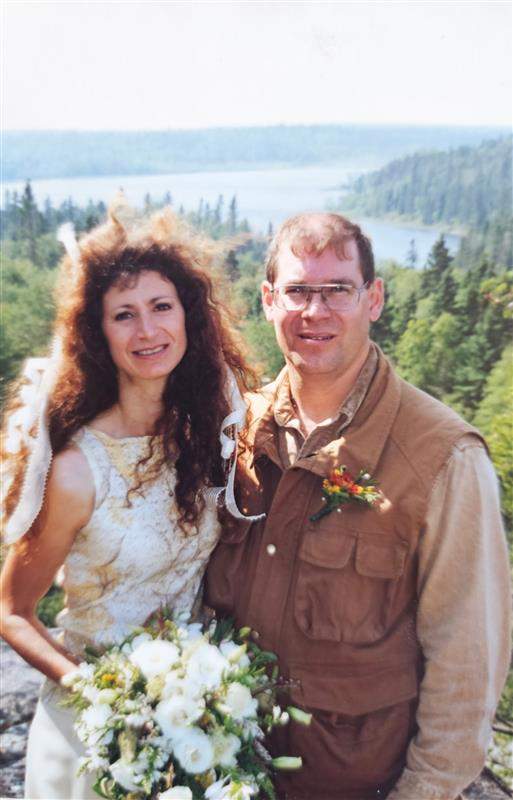 Pat and Russ Popp got married on top of a cliff overlooking Tulabi Falls in Nopiming Provincial Park.