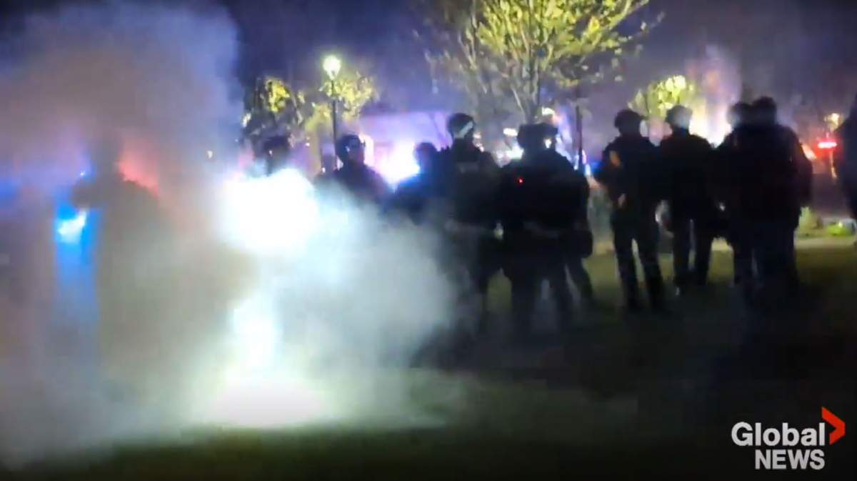 The demonstrators accused police of using pepper spray, batons and flash bangs to break up the encampment, while police defended their actions saying some of the protestors were throwing water bottles and other items at officers.
