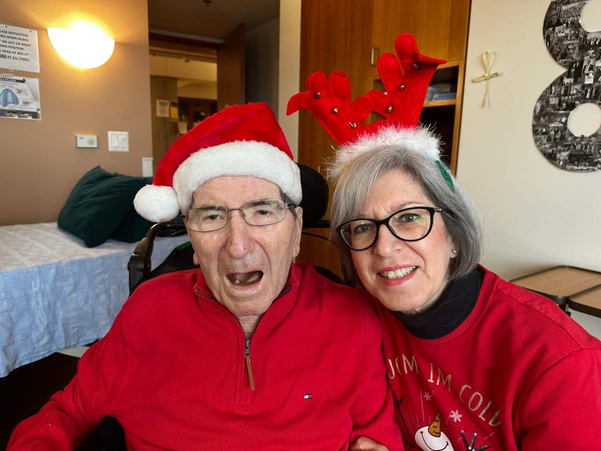 Rina Paniccia and her father Giovanni Greco dressed up for Christmas.