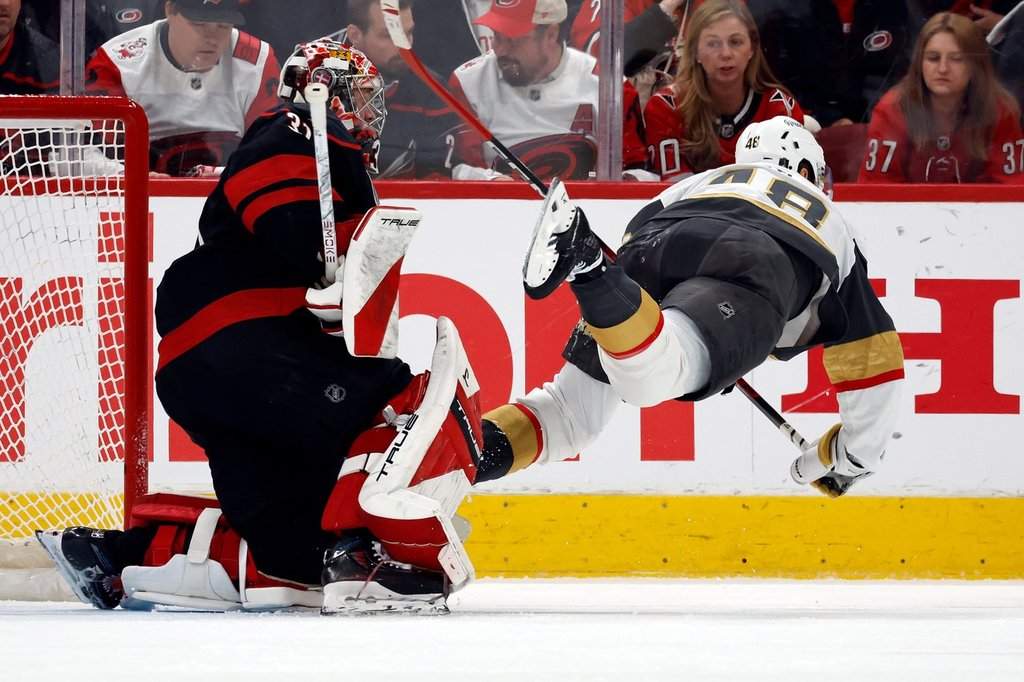 The Vegas Golden Knights' Tomas Hertl (48) trips over Carolina Hurricanes goaltender Frederik Andersenn (31) during the second period in Game 1 of the NHL hockey Stanley Cup final series in Raleigh, N.C., Tuesday, June 2, 2026.