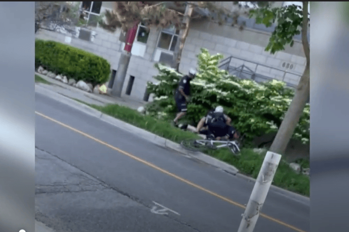 Police watchdog clears officer who tackled Toronto cyclist after ignoring stop sign
