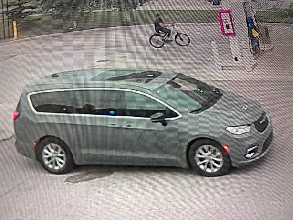 Edmonton police have released photos of a vehicle and a "person of interest" in a child luring investigation involving two 14-year-old girls.