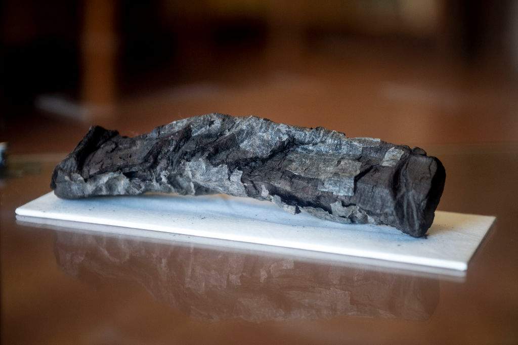 Papyri Herculaneum are seen in the National Library of Naples, on June 27, 2019 in Naples, Italy. The National Library of Naples (Biblioteca Nazionale di Napoli) houses the Herculaneum Papyri, a library of papyrus scrolls carbonized by the eruption of Mount Vesuvius in the first century AD. The papyri contain a number of Greek philosophical texts and represent the only library that survives from Greco-Roman antiquity. Many of the scrolls are too fragile to physically unroll and researchers have turned to digital-imaging techniques to reveal the contents of the papyri.