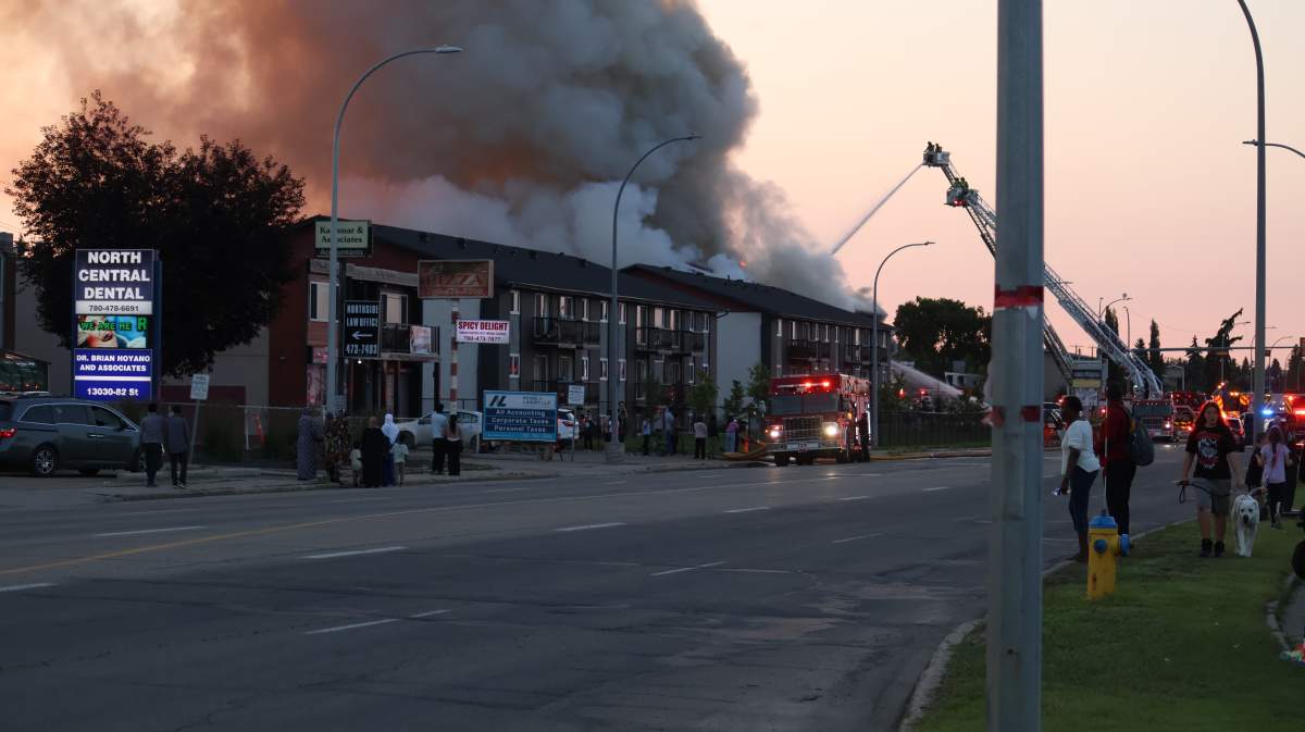 Fire crews respond to a fatal blaze at a mixed-use residential and commercial building at 13126 82 St. in northeast Edmonton on Monday, July 13, 2026.
