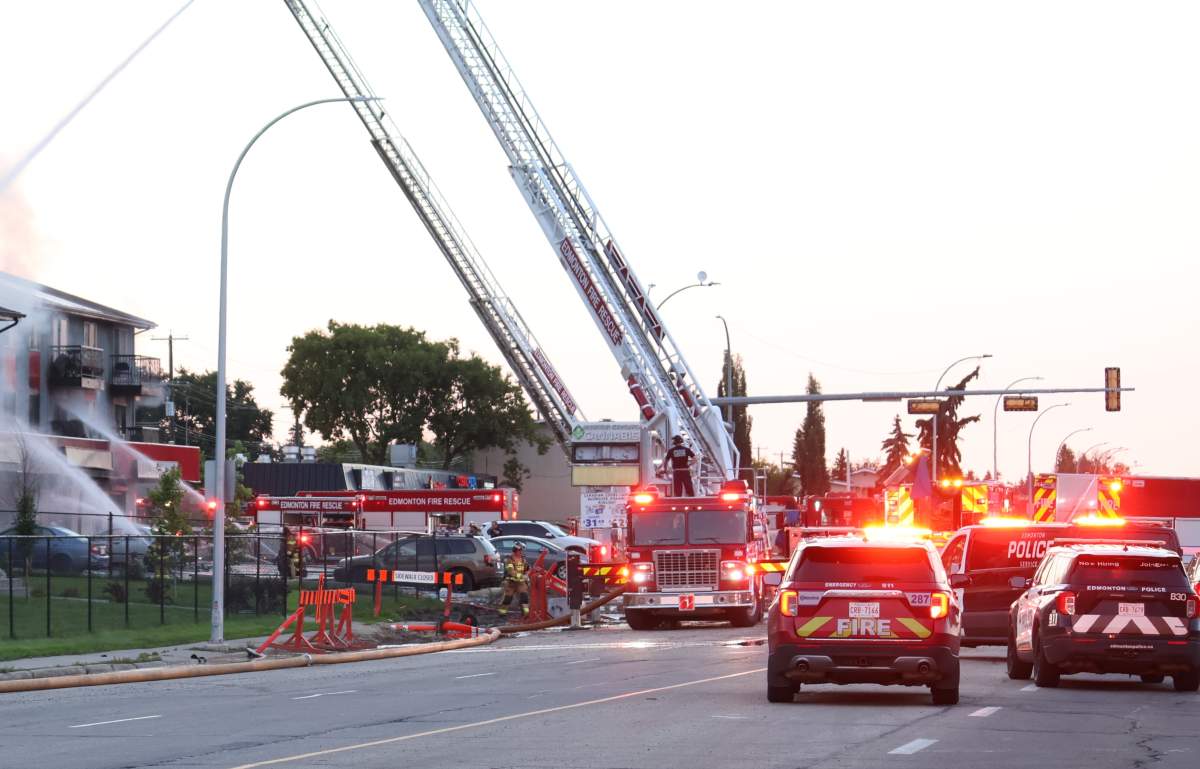 Fire crews respond to a fatal blaze at a mixed-use residential and commercial building at 13126 82 St. in northeast Edmonton on Monday, July 13, 2026.