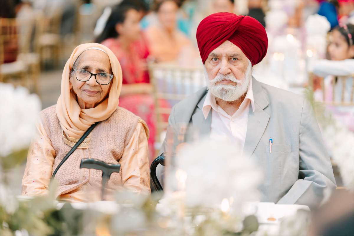 Surinderjit Kaur Bhandal, 82, and her husband Major Singh Bhandal, 85, and the wedding of their grandson Lali Toor in 2025.