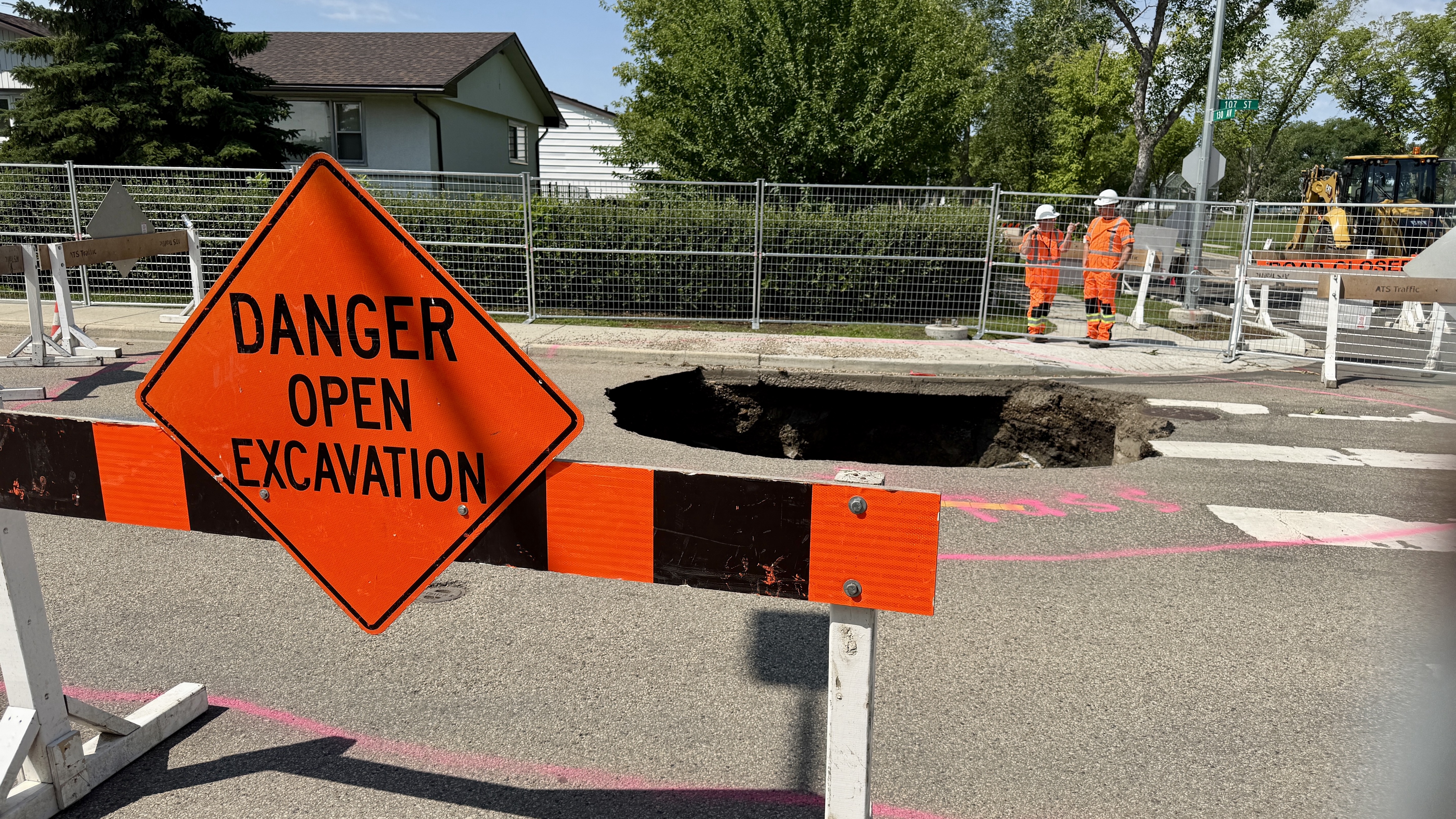 Deep sinkhole opens in north Edmonton after weekend thunderstorms