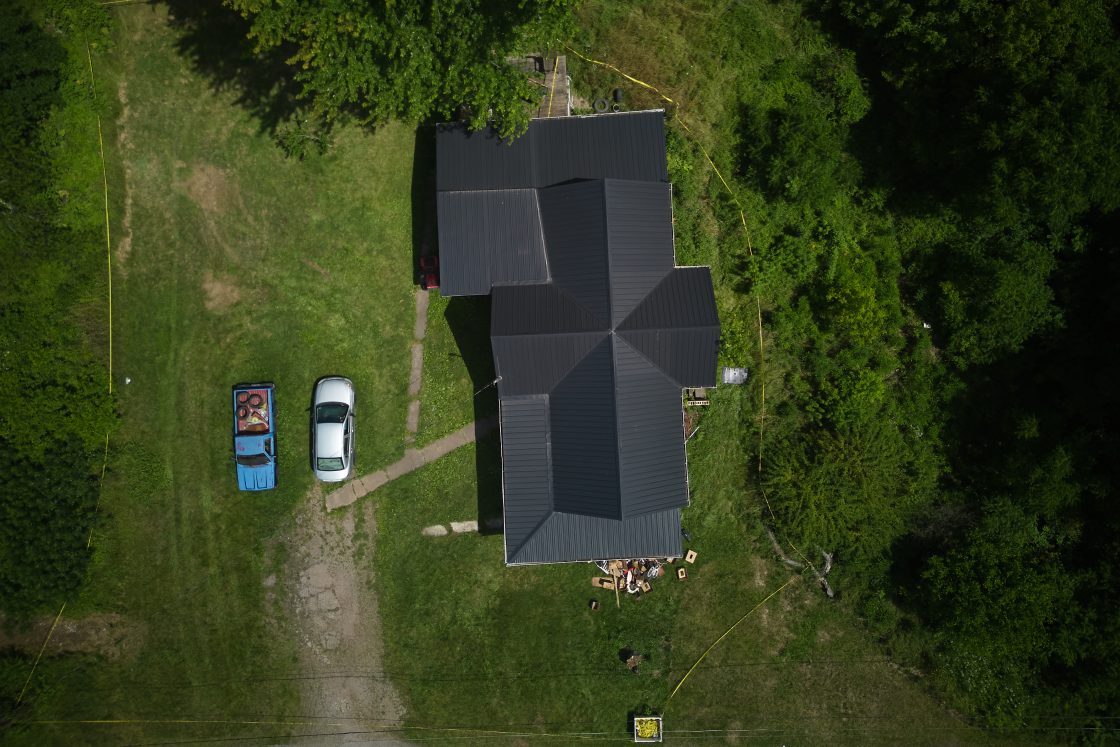 Police tape surrounds a home where authorities say they removed 16 children and arrested four adults in Hamden, Ohio, July 1, 2026.				 
										
					 
					AP Photo/Carolyn Kaster