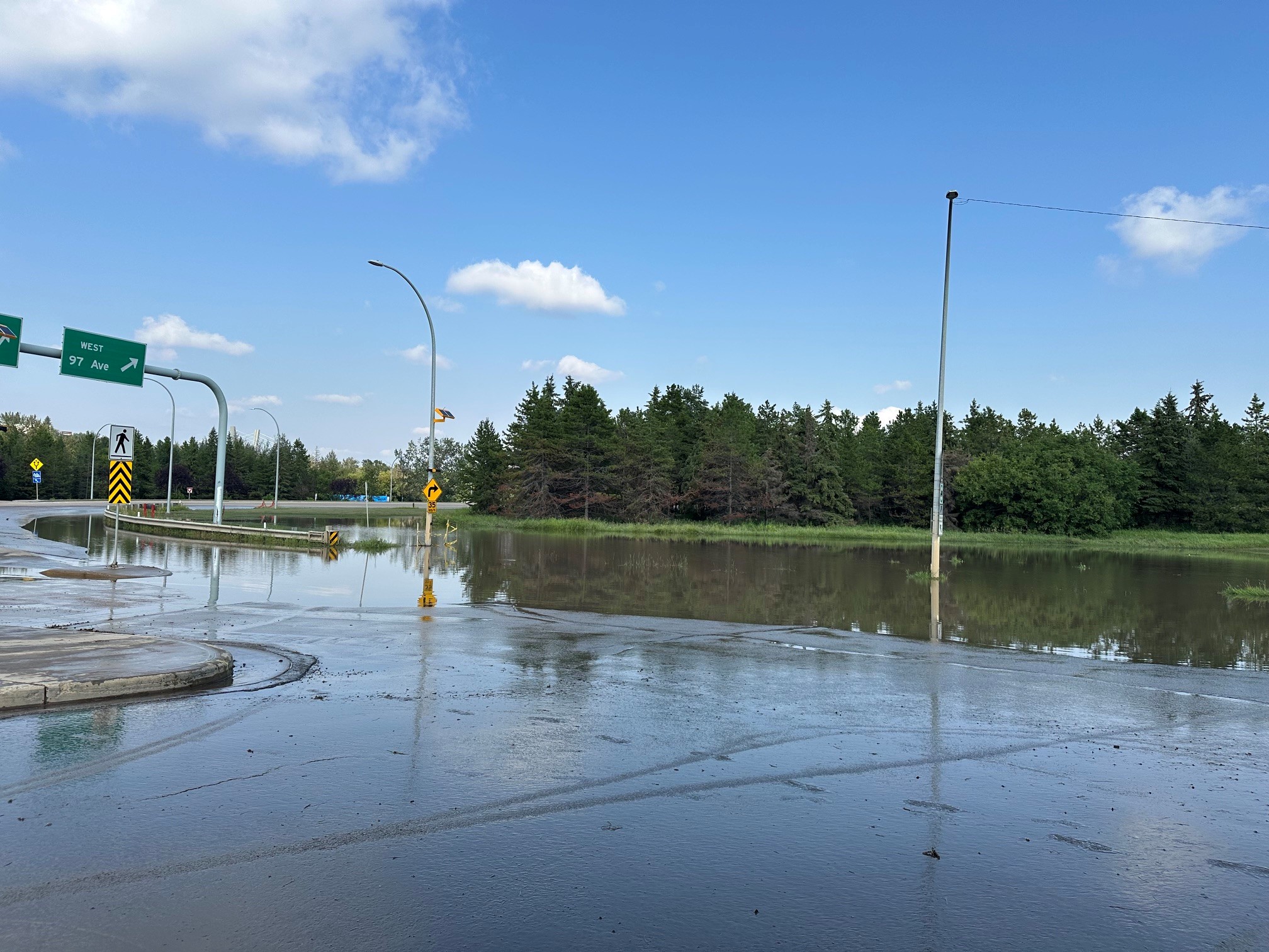The interchange of Connors Road, Scona Road and 98 Avenue was shut down due to massive flooding from an afternoon storm in Edmonton on Monday, July 27, 2026.