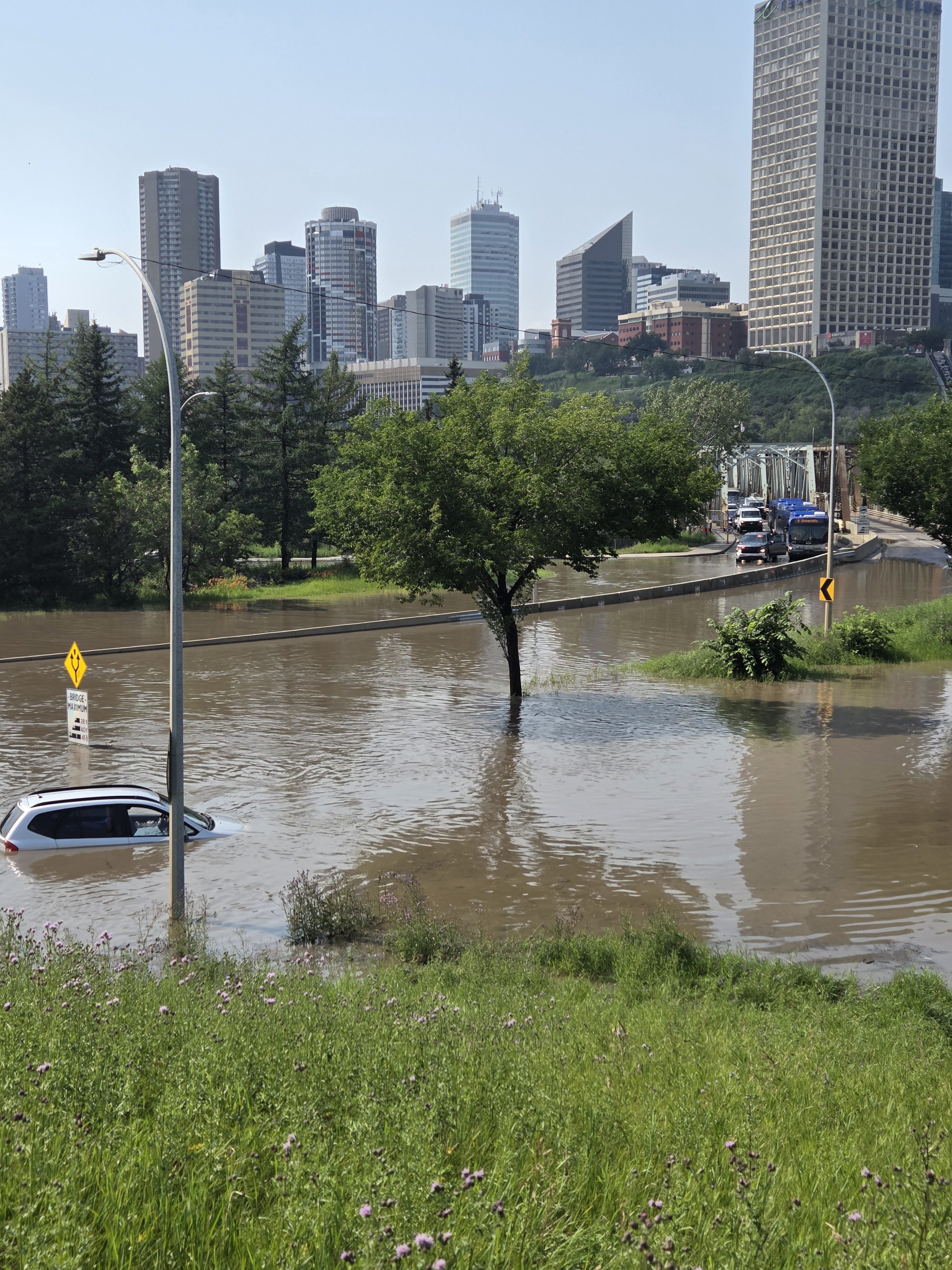 The interchange of Connors Road, Scona Road and 98 Avenue was shut down due to massive flooding from an afternoon storm in Edmonton on Monday, July 27, 2026.