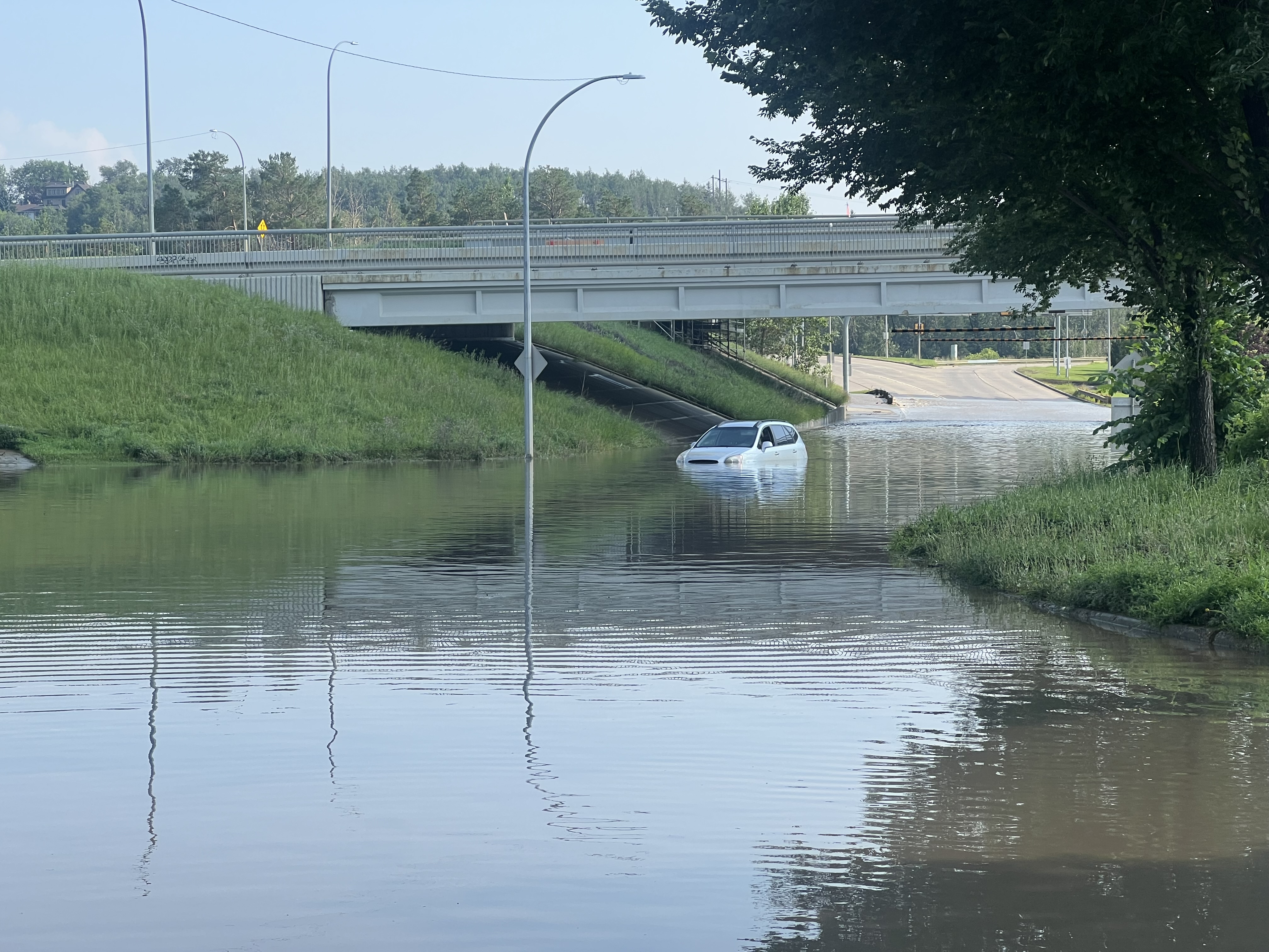 The interchange of Connors Road, Scona Road and 98 Avenue was shut down due to massive flooding from an afternoon storm in Edmonton on Monday, July 27, 2026.