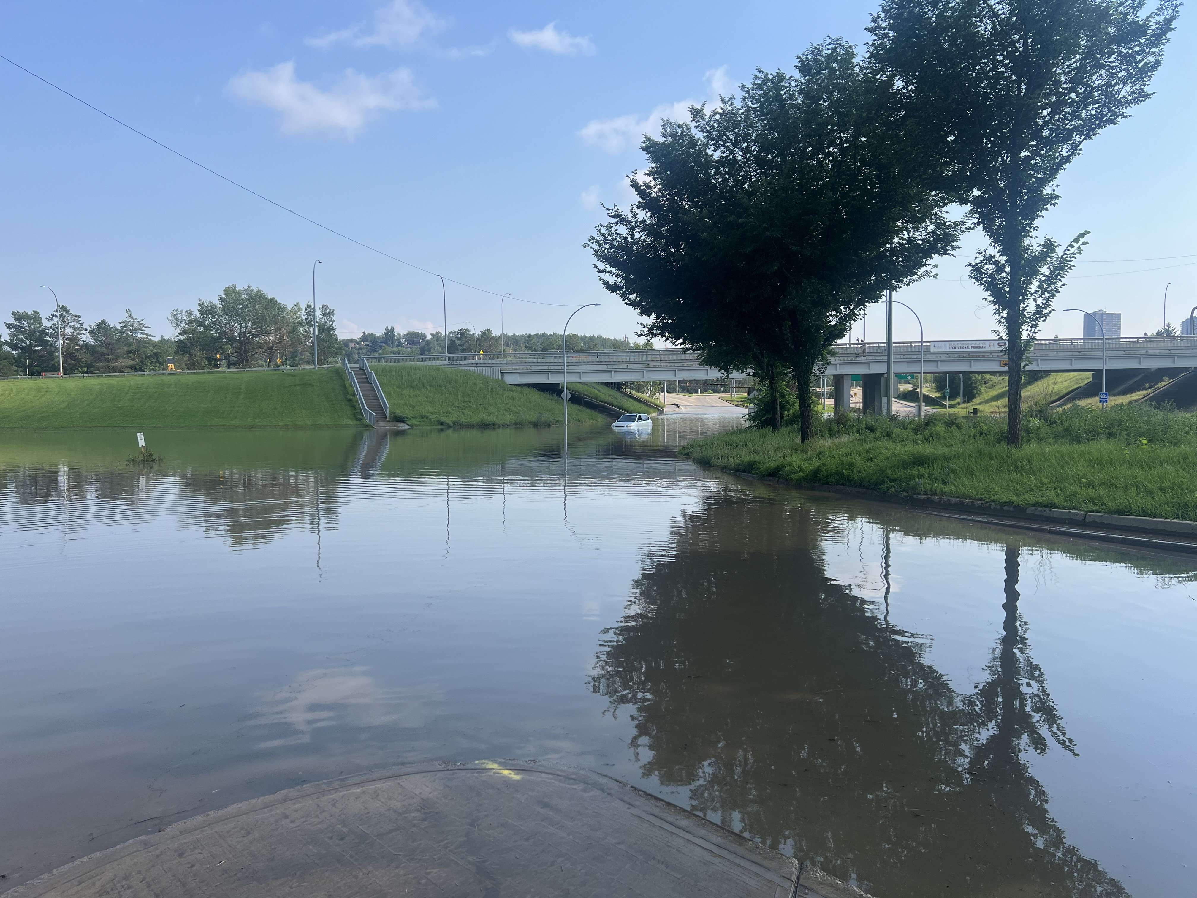 The interchange of Connors Road, Scona Road and 98 Avenue was shut down due to massive flooding from an afternoon storm in Edmonton on Monday, July 27, 2026.