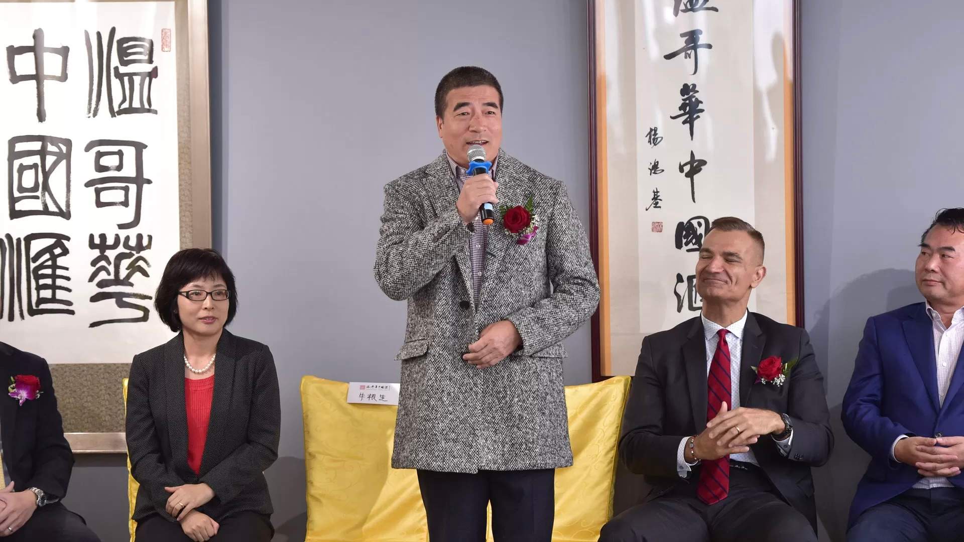 Chinese citizen Rong Xiang ‘Tiger’ Yuan, standing, next to then-Liberal MP Joe Peschisolido at a 2018 event.