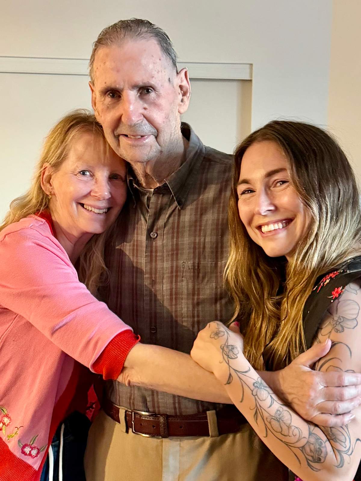 Shiloh Belleville (left), John Belleville (centre) and John’s granddaughter (right) reunited shortly after John was reunited with his family in Vancouver.