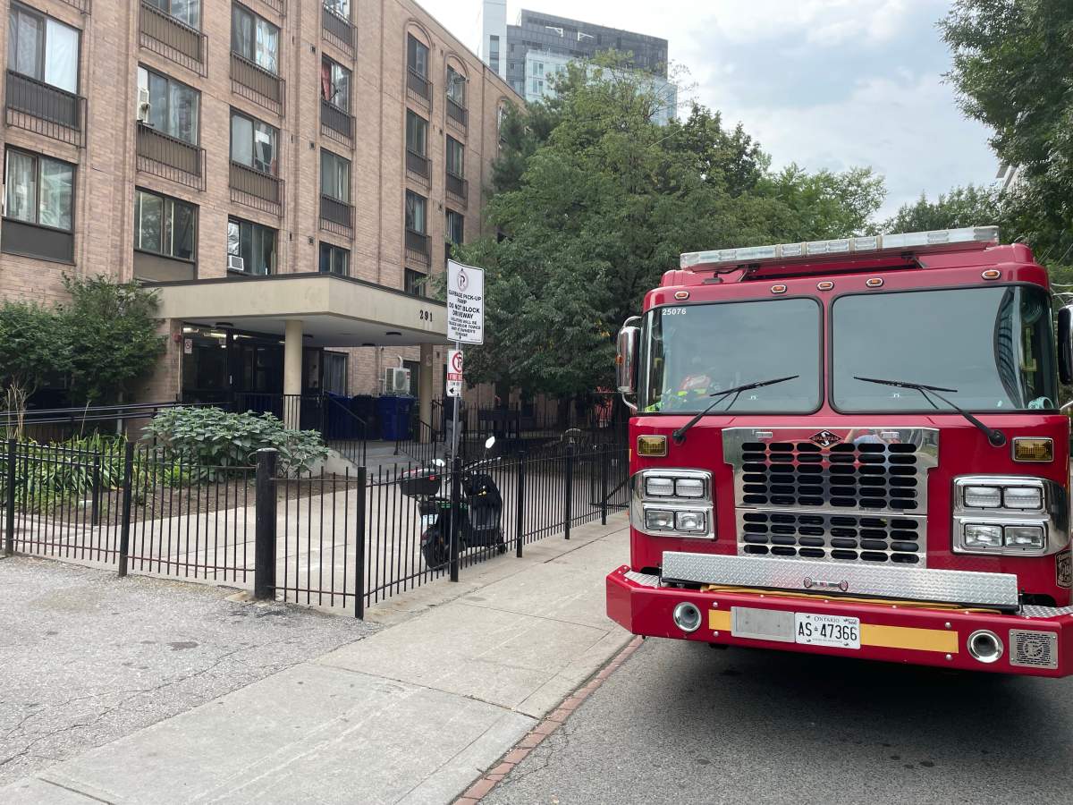 Toronto fire crews outside an apartment building where a lithium-ion battery fire broke out on Aug. 12.