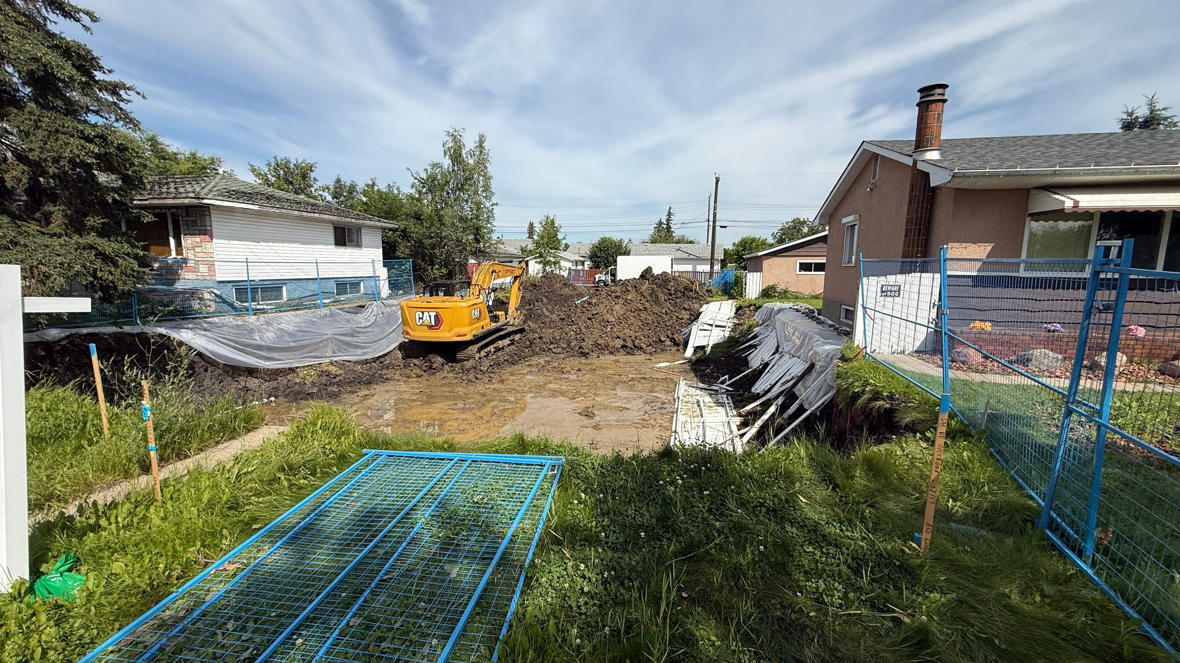 Edmonton Homeowners' Properties Eroding into Infill Excavations Amid Heavy Rains