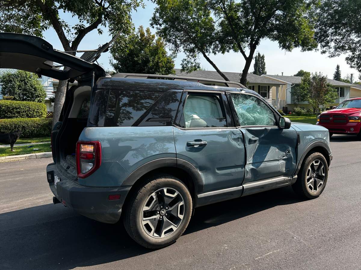 A Fort Bronco SUV involved in a collision with an electric dirt bike in St. Albert, Alta. on Thursday, Aug. 27, 2026.