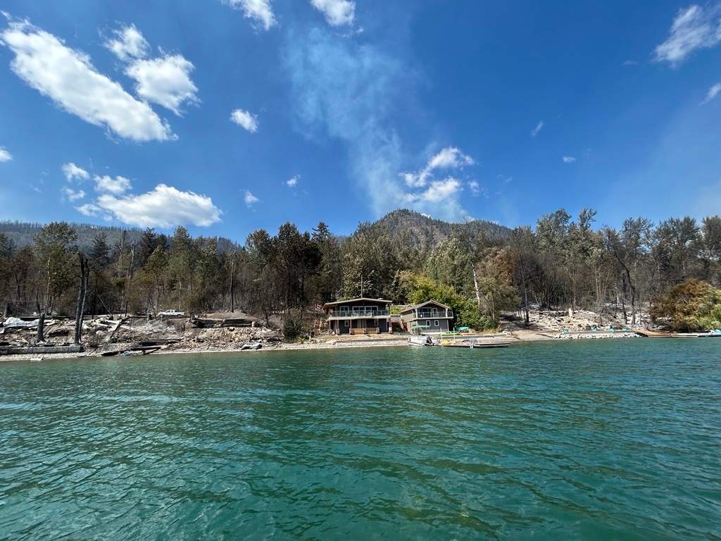 Properties damaged by wildfire on Newport Beach near Vernon, B.C., on Aug. 3, 2026.