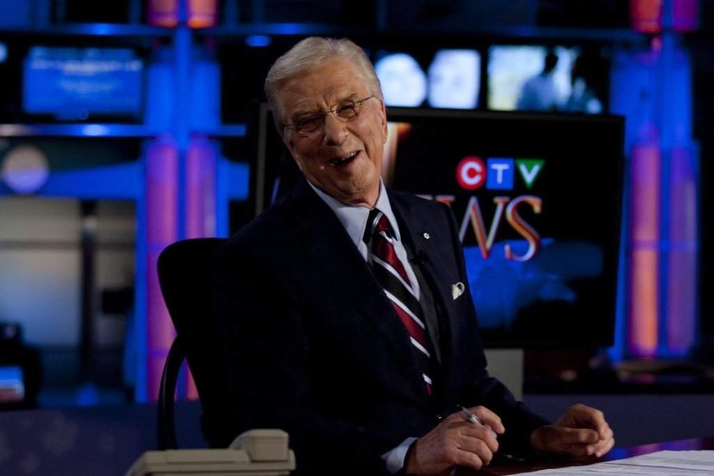 CTV news anchor Lloyd Robertson reacts during an ad break in his final newscast on Thursday, Sept. 1, 2011. Robertson has died at 92.
