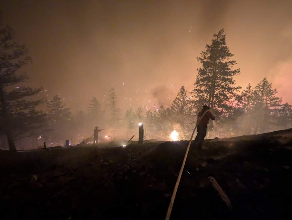 Fire crews fight the Bald Range wildfire west of Summerland, B.C., in this Aug. 7, 2026, handout photo. THE CANADIAN PRESS/Handout — B.C. Wildfire Service