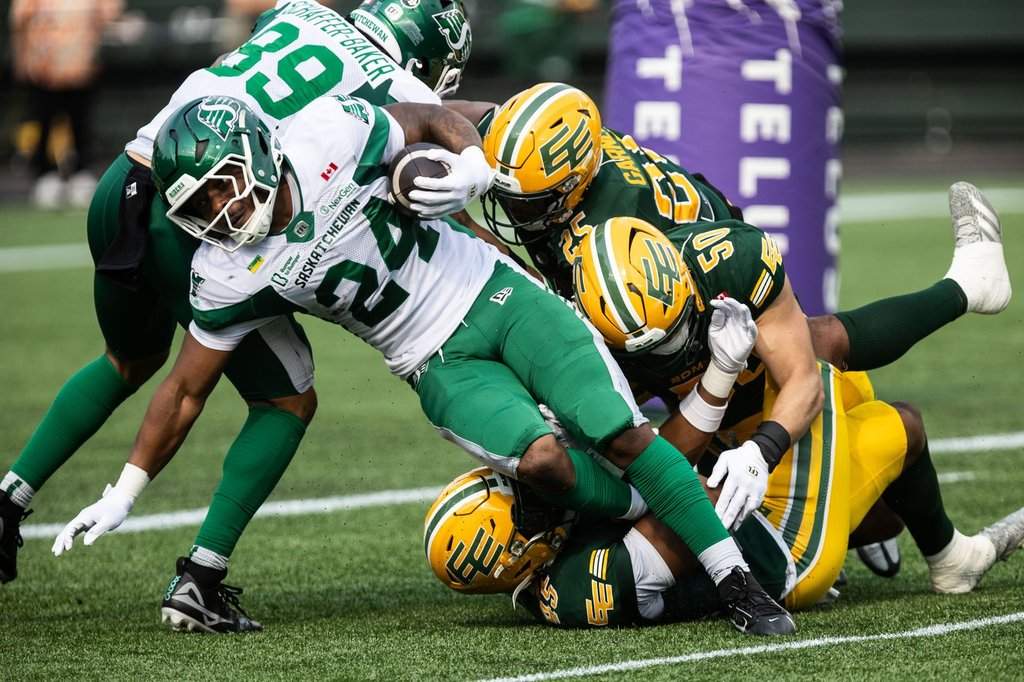 Stevens scores three TDs as Roughriders edge Elks 28-26